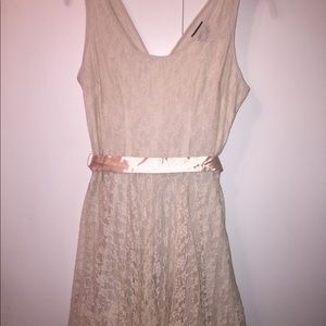Cream colored v neckline tea dress